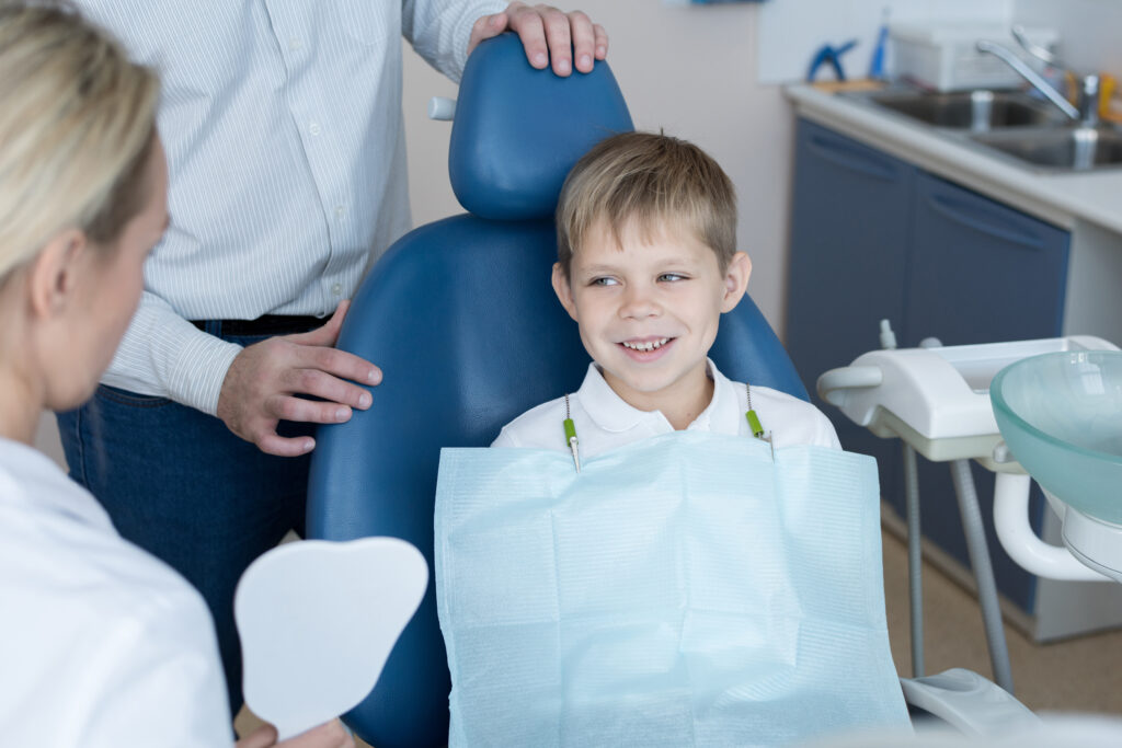 Brave Little Boy Visiting Dentist at Beussink Family Dentistry